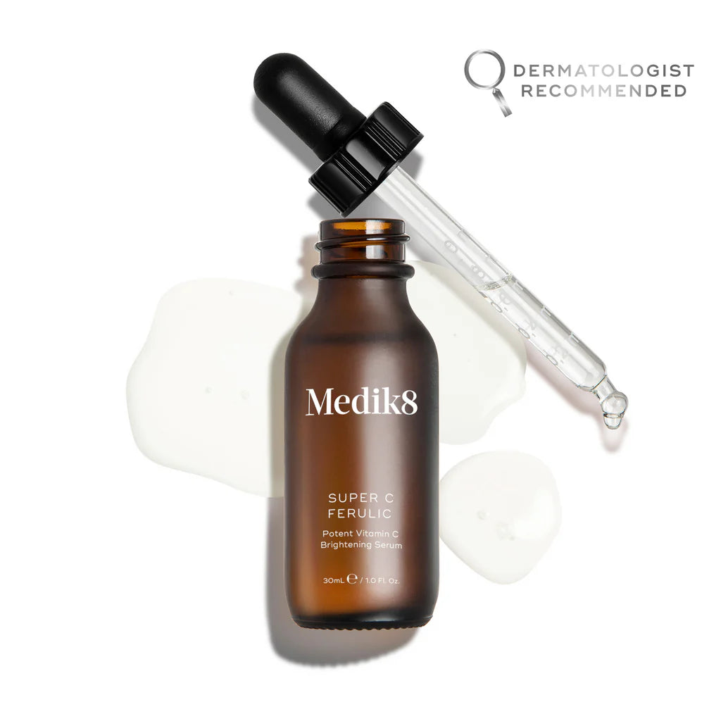Brown Medik8 Super C Ferulic serum  bottle with dropper on a white background