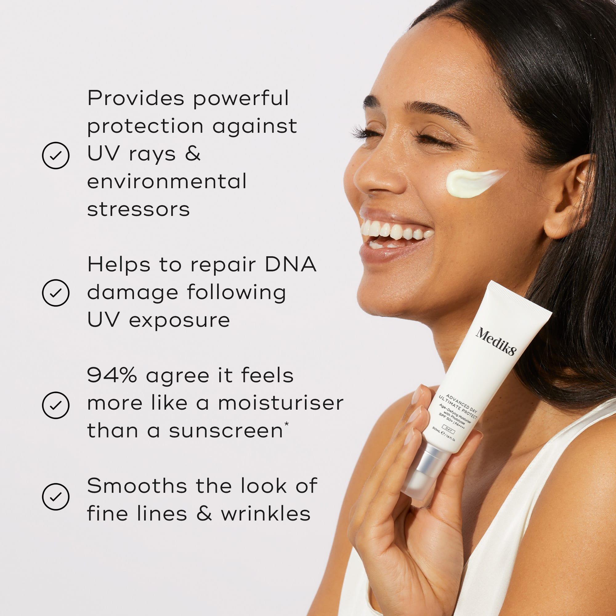 Woman applying sunscreen with Medik8 product, text about UV protection and benefits.