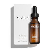 A bottle and box of Medik8 C-Tetra Liquid Vitamin C Radiance Serum