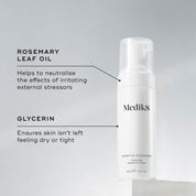 A pump bottle of Medik8 Gentle Cleanse, hydrating facial foam for sensitive skin, with a grey and minimalistic design, alongside key ingredients.