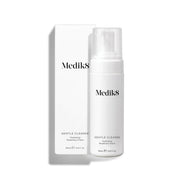 A pump bottle of Medik8 Gentle Cleanse, hydrating facial foam for sensitive skin, with a white and minimalistic design, alongside a box