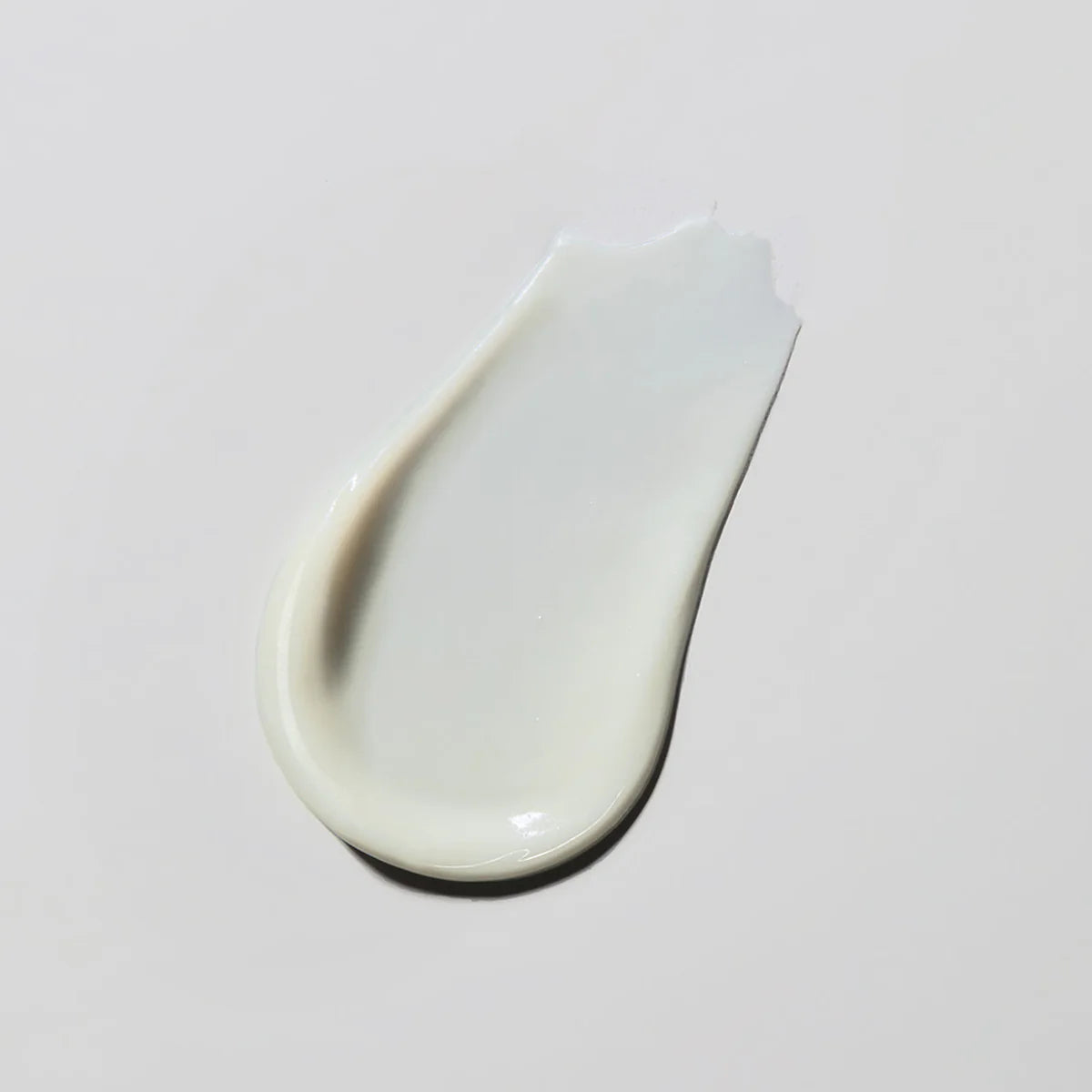 White cream on  a light gray background