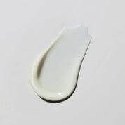 White cream on  a light gray background